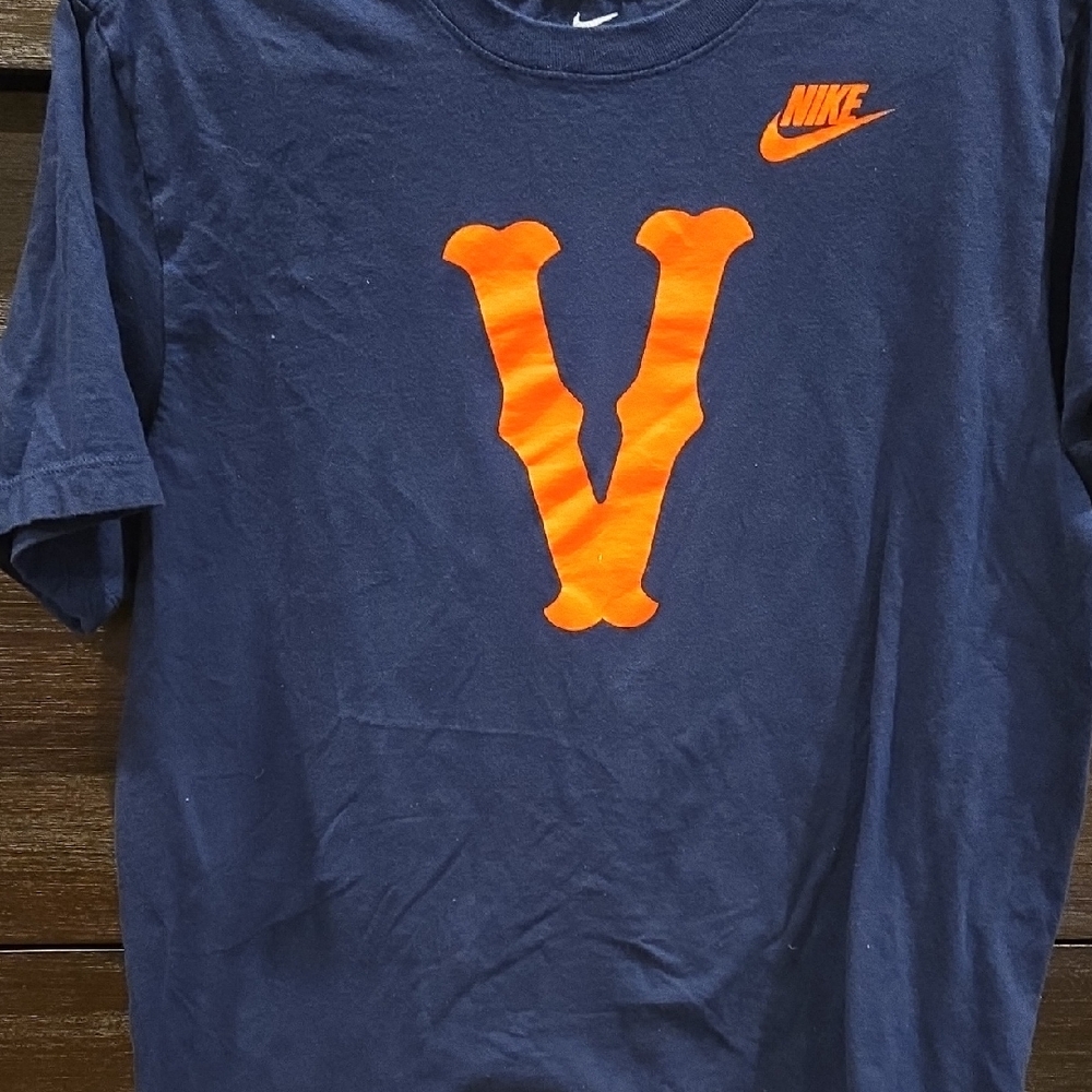 Nike Dark Blue Tee with Vibrant Orange Design